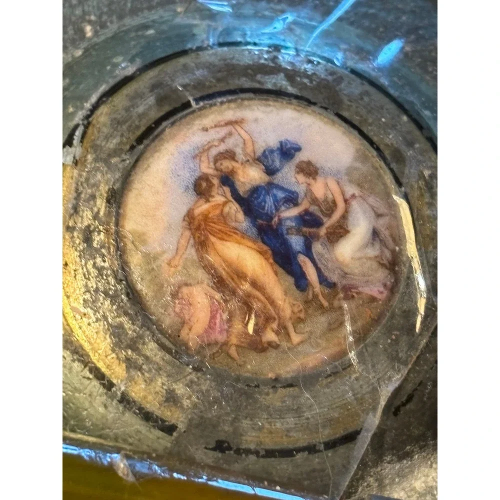 This vintage Victorian powder/music box is a rare and charming collectible piece